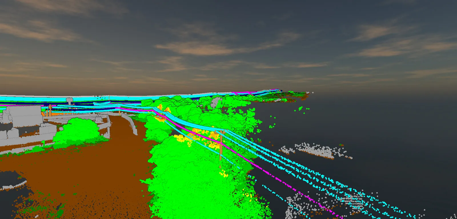 A classified point cloud of the Kawaihae corridor looking along the lines toward the harbor water, vegetation near the wires flagged.