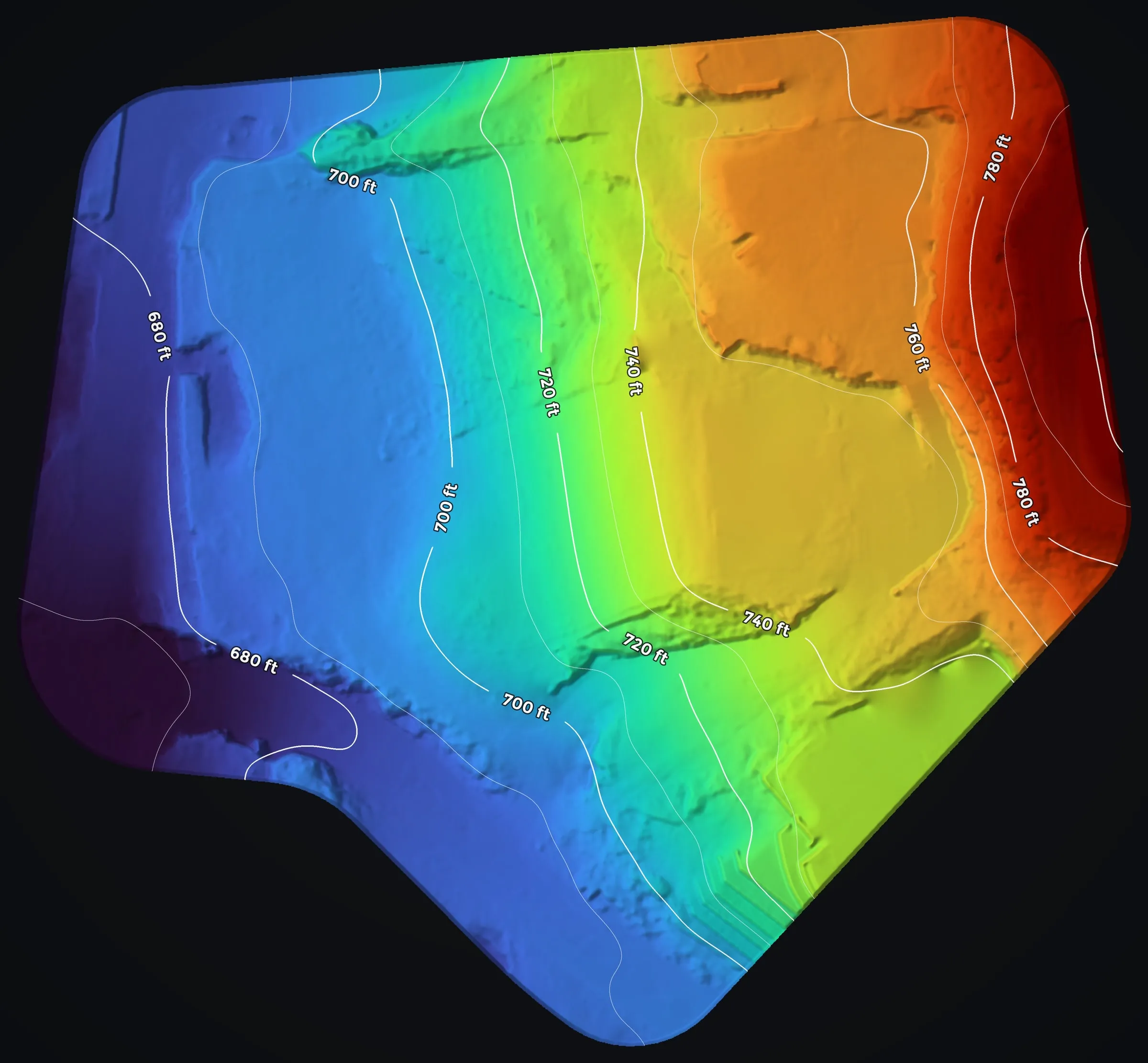 The bare earth of the whole parcel colored by elevation from blue on the low west side to red on the high east side, contoured every 10 ft.